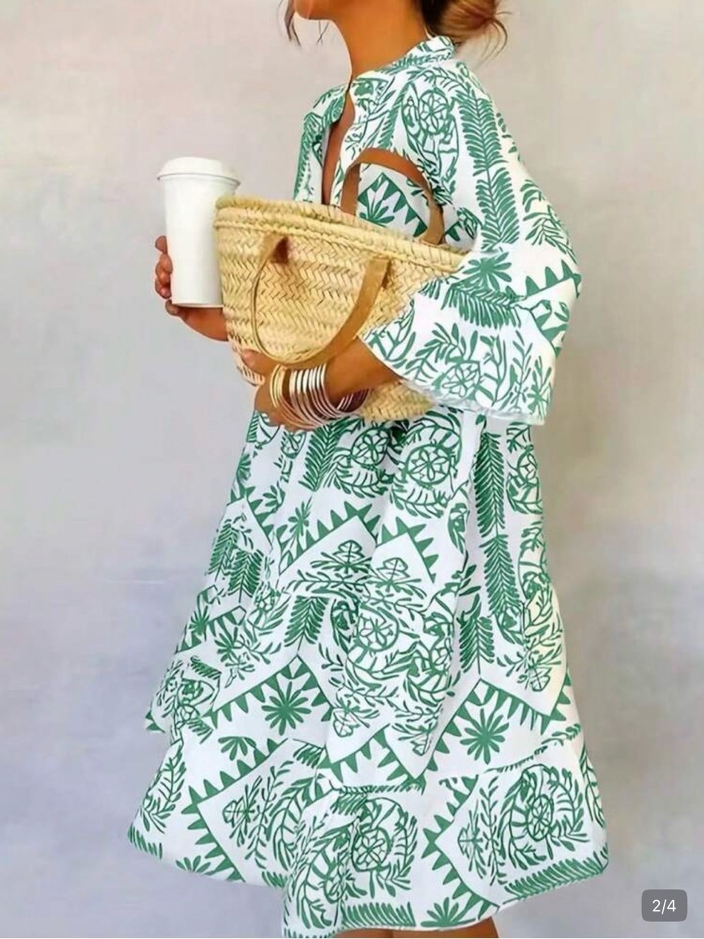 Green and white dress with flowing sleeves